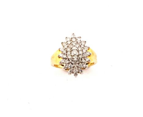 A 9ct Gold and Diamond cluster ring, size N