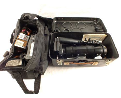 A cased Zenit 125 camera with 4.5/300 lens and Minolta, Canon and a quantity of various telescopic and other lenses and acces