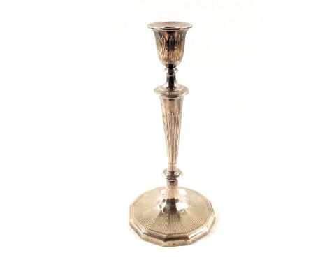 A white metal candlestick, height 11"