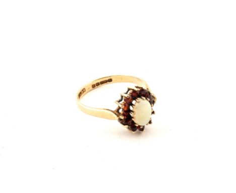 A 9ct Gold Opal and Garnet ring, size M