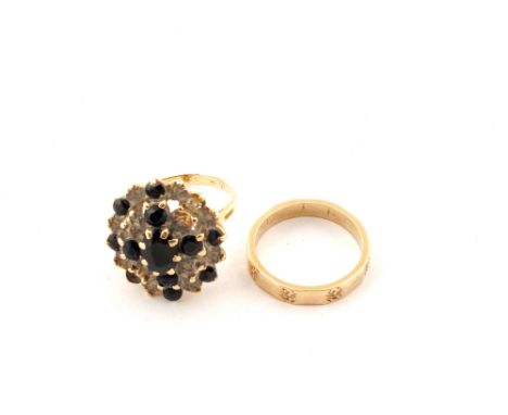 A 9ct Gold cluster ring, size K and a 9ct Gold band, size J