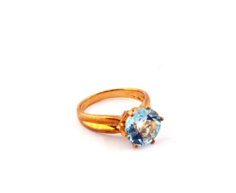 A 9ct Gold solitaire ring set with a blue stone, size N