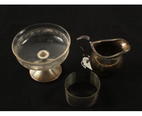 A Silver cream jug, bangle and a Silver base sundae dish