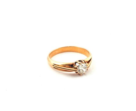 A solitaire Diamond and Gold ring, size N