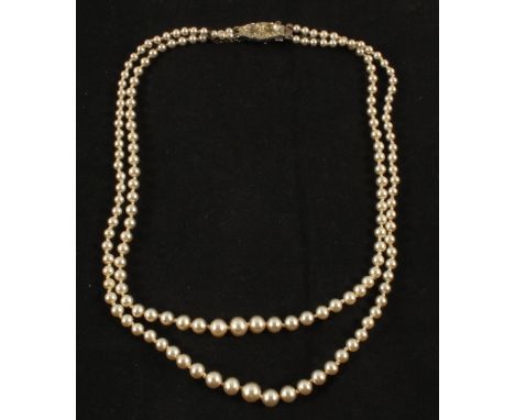 A double string pearl necklace with Silver clasp