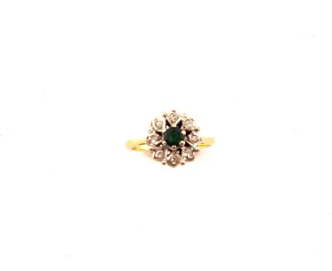 An 18ct Gold and Diamond and Emerald set ring, size J