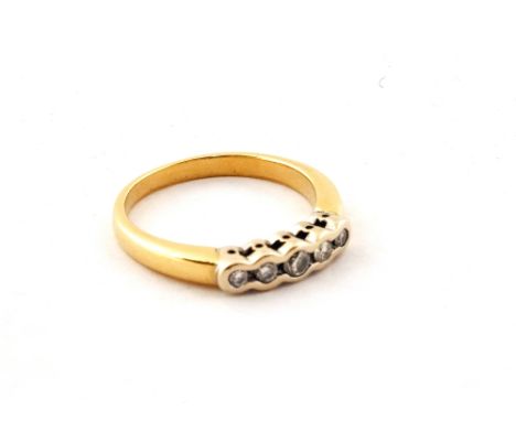 An 18ct Gold ring set with five round brilliant cut Diamonds on White Gold setting, approx .27ct, size Q