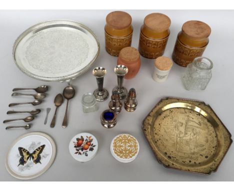 A selection of various EPNS and metal tableware such as a cake stand, salt and pepper shakers and a candlestick along with se
