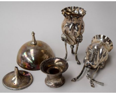A pair of Victorian silver posy vases, on tripod hoof legs with ram's head finials, one as found, William Comyns & Sons, Lond