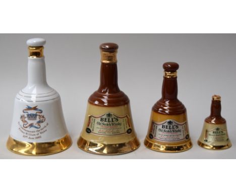 Four Bell's Scotch Whisky decanters, one commemorative, one 37, one 75, one 18.9cl, and one miniature, three sealed (4)