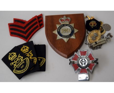 A vintage enamel metal car radiator badge for The Order of the Road, four Corps of Commissionaires cloth patches, a Ministry 