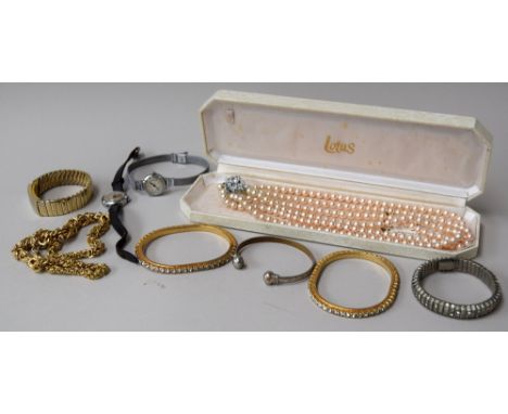 A selection of yellow and white metal bracelets, together with two wrist watches and a Lotus stimulated pearl necklace