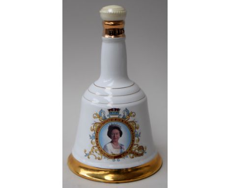 A Bell's Scotch Whisky commemorative Wade porcelain decanter (75cl)