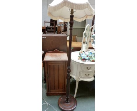 A mid century cabinet with one door and one shelf within 39 x 34 x 77cmH, together with a wooden standard lamp