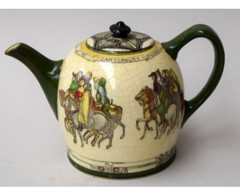 A Royal Doulton 'Canterbury Pilgrims' teapot, the ivory body decorated with scenes of pilgrims and the handle and spout in da