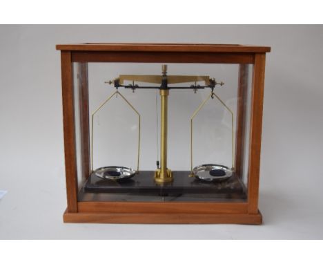 A Griffin & George Limited set of scientific scales, in a wooden box with glazed sides