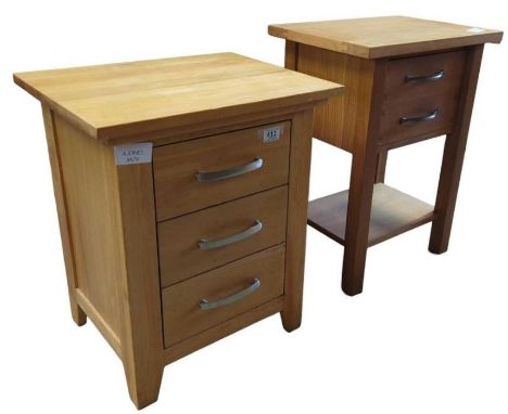 A modern light oak three drawer cabinet, 59cms high together with a light oak side table with two drawers and lower shelf, 65