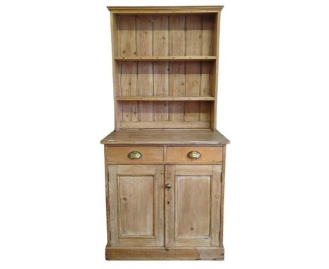 A late 19th/early 20th Century stripped pine kitchen dresser having open shelf back and the base fitted with two short drawer