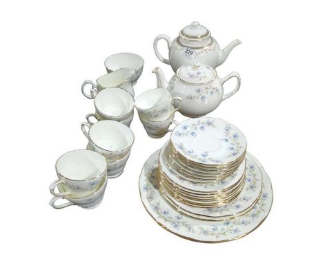 A Duchess Tranquillity tea service together with a Royal Worcester Juliette teapot