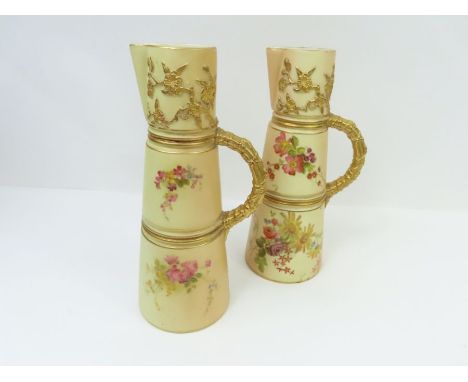 A Royal Worcester porcelain jug of tapering form, blush apricot with painted floral decoration and raised gilt prunus detail,