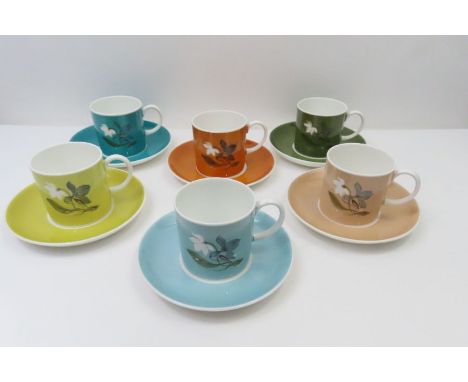 A boxed gift set of Susie Cooper coffee cups and saucers each cup with a different floral design