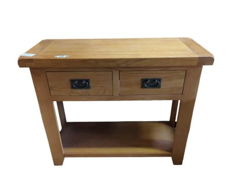 A modern light oak side table fitted with two short drawers and with lower shelf, 71cms high 85cms wide 34cms deep