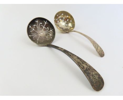 A George III sterling silver sifter ladle, along with a 20th century example, 58 grams