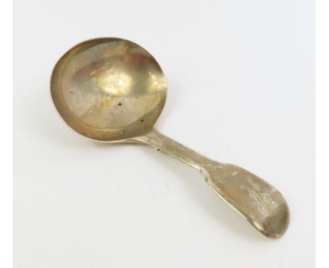 A late Georgian silver caddy spoon, London 1824, makers mark rubbed, 8.2cm long, 14.3 grams 