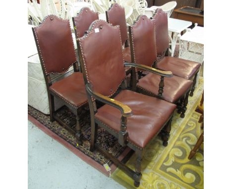 Set of six oak upright upholstered arch backed dining chairs on baluster turned front legs.  (6)