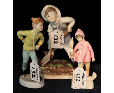 Three Royal Worcester bone china figurines: 'Tuesday's Child is Full of Grace, Days of the Week: Tuesday Boy'; 'Peace' by F.G