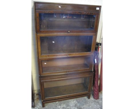 Mid Century oak Globe Wernicke type four section glazed bookcase.