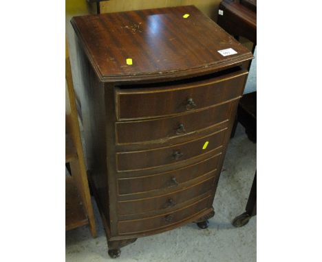 Small reproduction mahogany bow fronted chest of six drawers on cabriole legs.