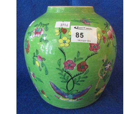 Chinese Canton porcelain green ground ginger jar with overall coloured enamel decoration of insects and flowers.  Unmarked.