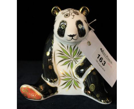 Royal Crown Derby bone china paper weight in the form of a seated Giant Panda with gold button to base, with box.