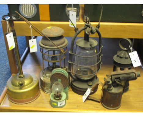 Group of assorted Tilley and other hurricane type lamps and oil lamps, brass blow lamp etc. (6)