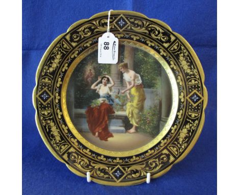 Vienna porcelain cabinet plate with heavily gilded foliate and floral border around painted centre panel depicting two Classi