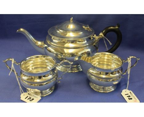 Silver three piece tea set comprising: teapot; two handled sucrier and cream jug, London, matched hallmarks.  23 Troy ozs  ap