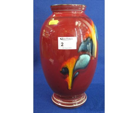 Poole Pottery red ground ovoid vase with coloured running glaze decoration.  Moulded marks with dolphin to base.