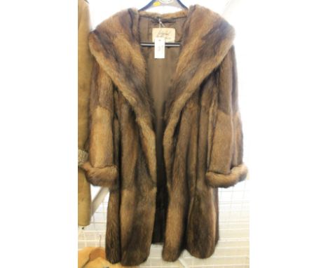 Lady's National Fur Company dark brown fur coat.