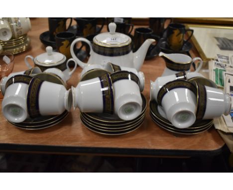 A 20th century part tea service by Noritake in porcelain with cobalt and gilt decoration