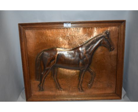 A vintage hand worked copper plaque picture of a race horse bearing signature in oak frame