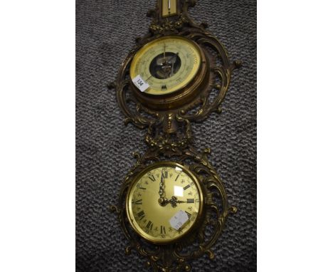 A mid century clock and barometer set having ormolu brass case