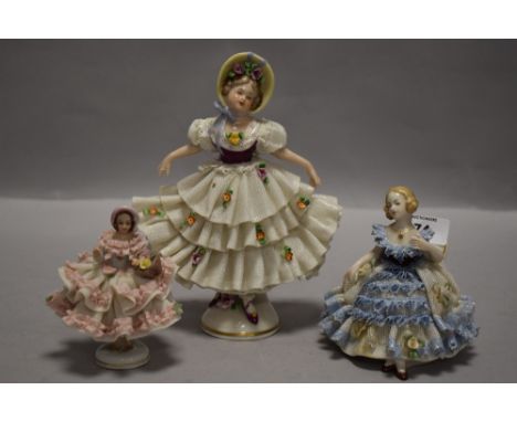 Three 20th century lace work porcelain figures including Frankenthal and Dresden