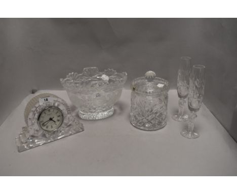 A selection of clear cut crystal glass wares including a Waterford mantle clock