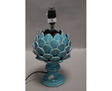 A ceramic table or side lamp in the form of an artichoke having azure blue glaze