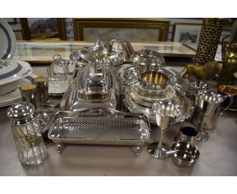 A selection of silver plate dinner and table wares including toast rack, tea pot and serving dishes