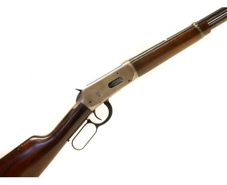 Winchester Model 94 30-30 lever action rifle, serial number 2704030, 20 inch barrel with full length magazine, barrel and tan