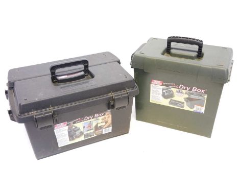 Two MTM range boxes full of black powder shooting equipment, including patches, wads, wad punches, priming tools, reproductio