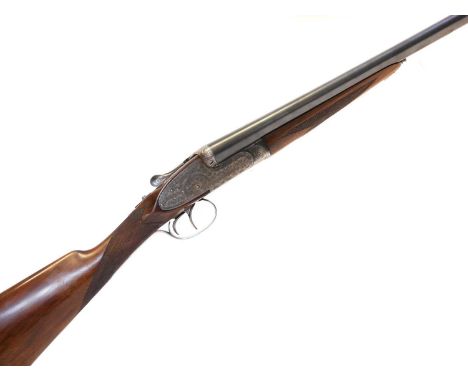 AYA 12 bore side by side shotgun, serial number 132073, 28 inch barrels with three quarter and half chokes, removable sideloc