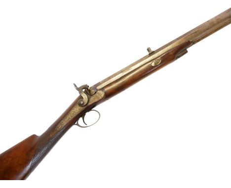 Percussion 20 bore rifle, 32inch octagonal barrel rifled with twelve grooves, completely unmarked, the back action lock engra
